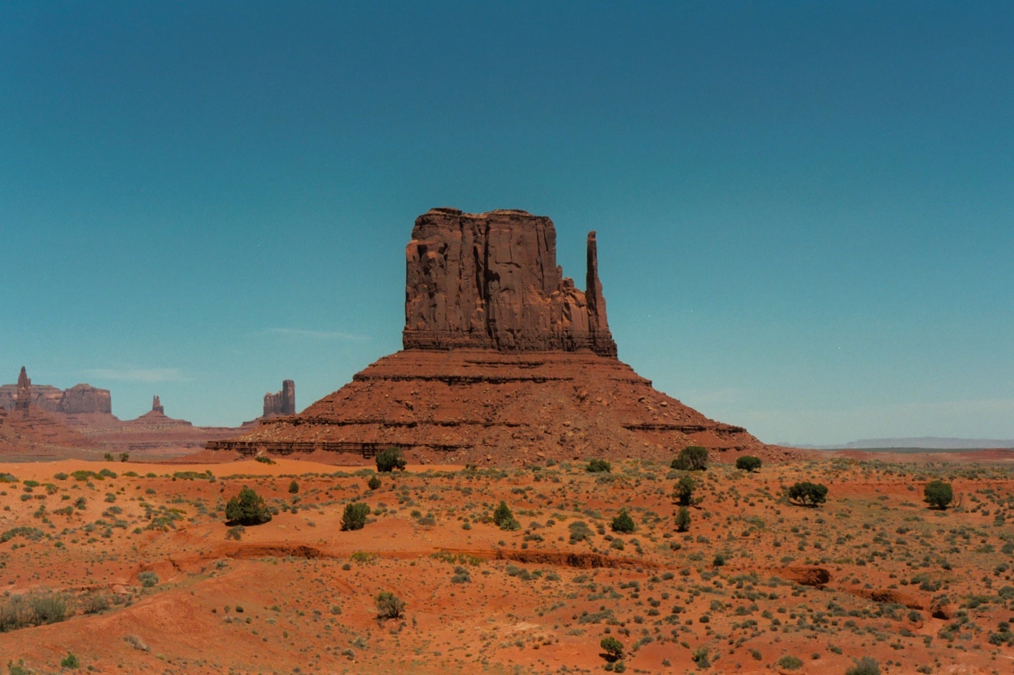 Huge, crumbling, red sandstone formations, as seen in many old Westerns.