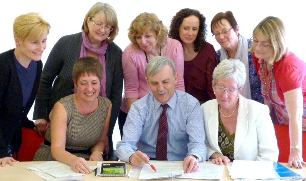 HSE Book Club Members Pen, Annie, Anne Marie, Tracey, Margaret and Karen, with Helen Rowlands, author Martin Edwards, and Eye Fund Chair Carol Sherry.