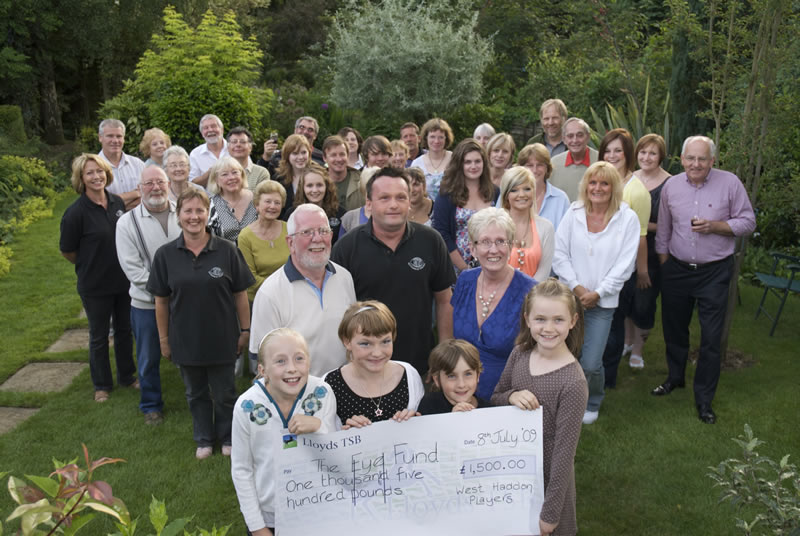 Haddon Players presenting their cheque for £1,500.