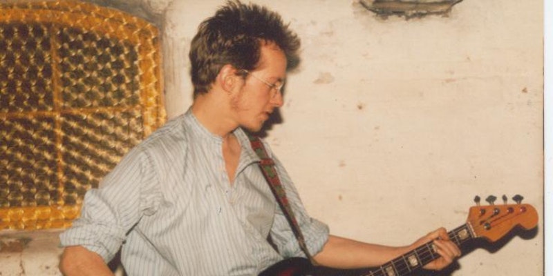 Simon playing a Jazz Bass at a gig when he was about 18.