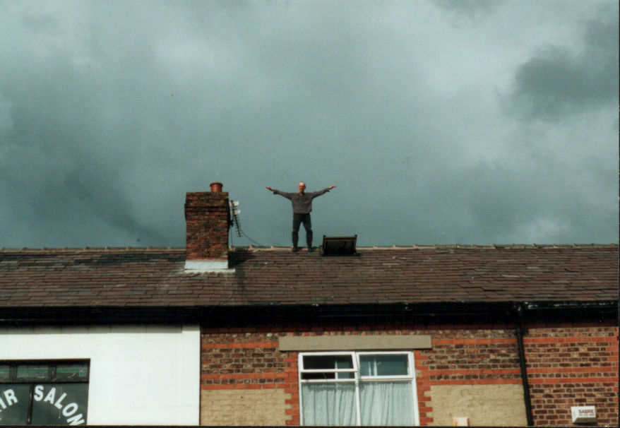Simon: dancing on the roof at Phil’s flat in Crosby, where he’d often turn up unannounced from Wales.