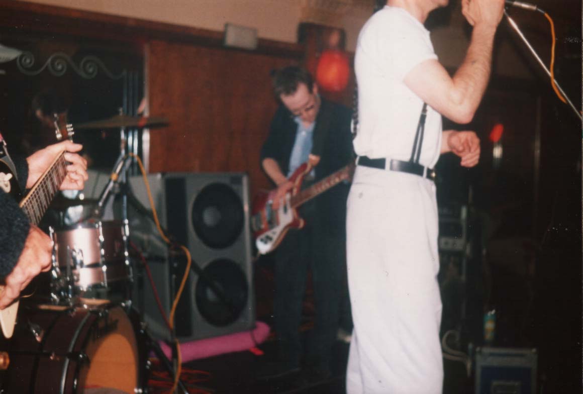 Simon: playing his Rickenbacker 4001 bass in a band at the Liverpool Royal Court, 1985.